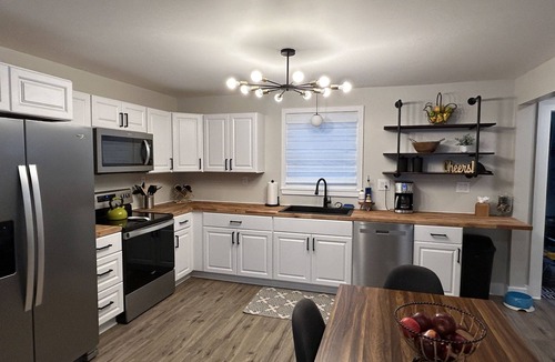 Alanson House | Devils Elbow Cottage on Crooked River with HOT TUB! Ski and Golf nearby!