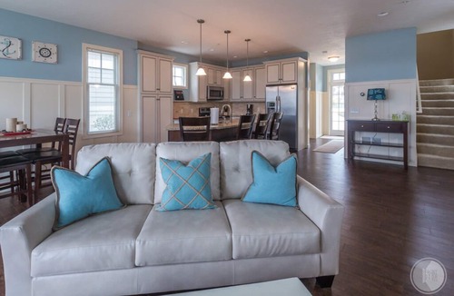 Saugatuck Condo | Discover comfort in Saugatuck at Lake Street Townhome #7, a 3BR retreat with pool views.