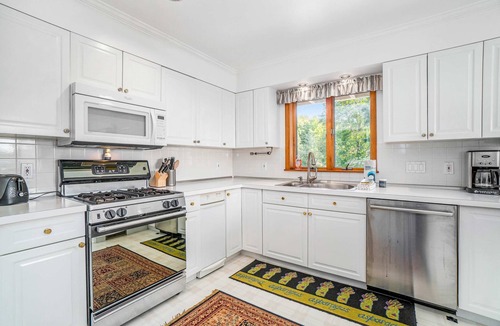 Arcadia House | Dog-friendly, lake view home with three season room, fireplace, video projector
