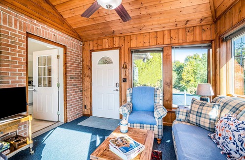 Arcadia House | Dog-friendly, lake view home with three season room, fireplace, video projector