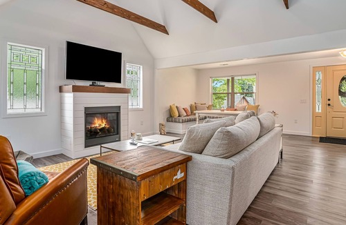 Paw Paw Lake House | Dog-friendly, updated home with deck, front porch, fire pit, WiFi, & fireplace