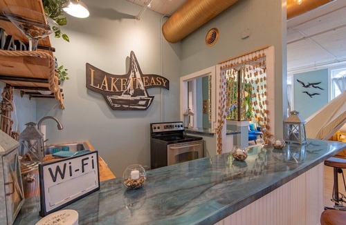 Lake Geneva Apartment | Downtown Lake Geneva Glamping Loft Walk to Lake Bar Kitchen Swings Sleeps 12