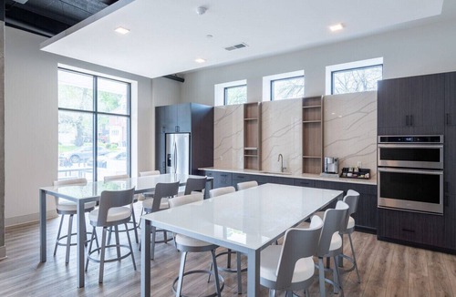 Lower East Side Apartment | East Side Luxury 1BR Apt - Near Brady St with Balcony and Lounge | Sleeps 4