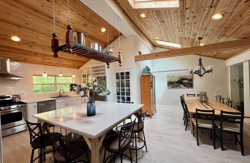 Powers Lake Villa | EXCLUSIVE LAKEFRONT with beach, beach house, piers, trampoline + sister villa