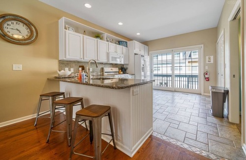 Saugatuck Condo | Experience comfort in this 3-bedroom townhome with stunning water views in downtown Saugatuck.