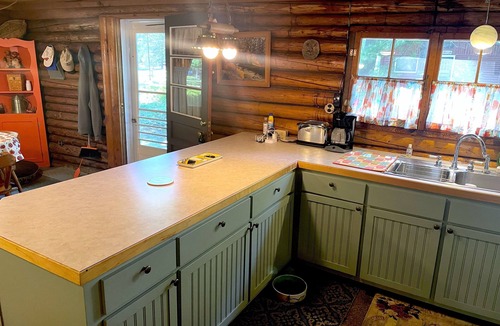 Rapid City Cottage | Family FUN: Torch Lake Cottage with Private Beach Access - Kayaks & SUP Provided
