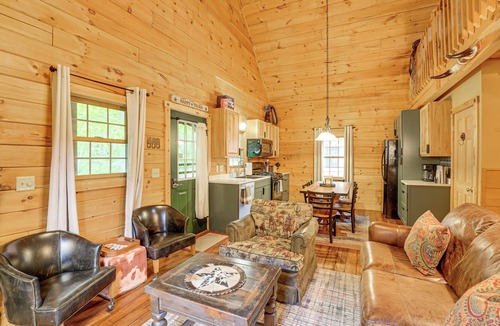 Oceana County Cabin | Fire Pit & Porch: Warm & Woodsy Rothbury Escape!