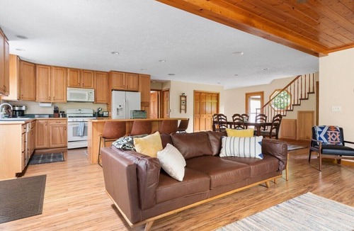 Mayfield House | Firefly Lodge on the Boardman River with Hot Tub and Woodstove