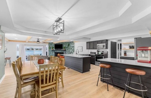 Commerce Township House | Fox Lake Retreat | Dock, Hot Tub, Sauna & Gameroom