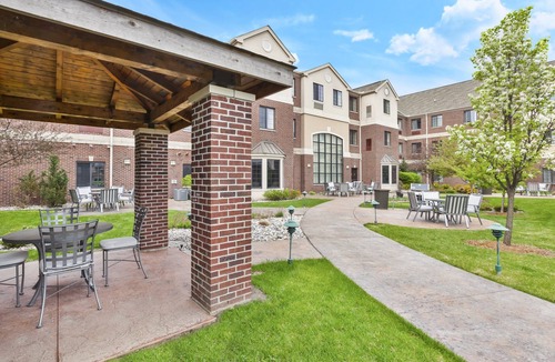 Okemos Condo | Free Breakfast Buffet. Near Michigan State University.