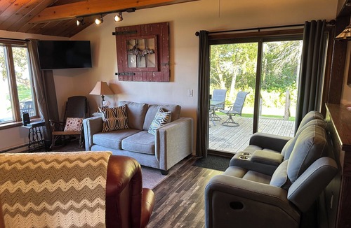Sault Ste. Marie House | Freighters in front yard! Private Sandy Beach - Large Deck - Best View on River