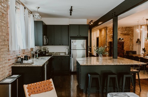 West Lakeview Condo | Gather Together & WFH in Piece of Chicago History