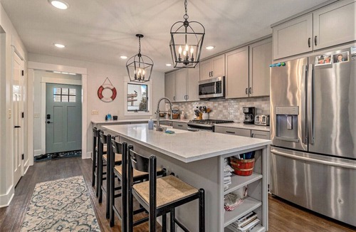Beulah House | Gorgeous Sunsets at Crystal Lake Waterfront Home