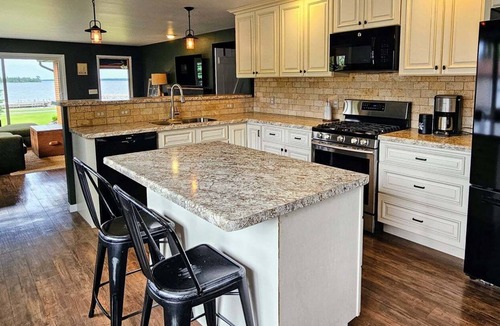 Hessel Cabin | Hessel Bay Resort: 6 cabins + main house. Sleeps 28. Waterfront Lake Huron. Community Dock.