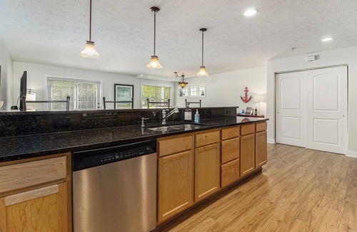 Traverse City Condo | High-End Downtown Traverse City Ground Floor Condo on Quiet Street