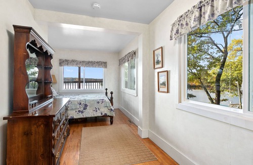 Newaygo House | Huge lake house. 3 levels. 9 bedrooms. Great for groups. Large beach. Fire pit.