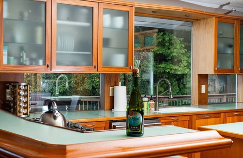 Suttons Bay House | Incredible Mid-Century Modern Waterfront Home on West Bay, on M22 - Sleeps 12