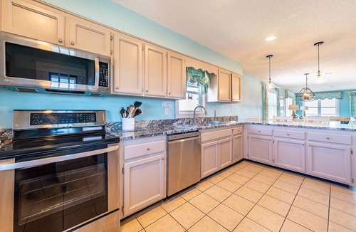 South Nags Head House | K1117 - Sunrise Views & Coastal Luxury – Community Pool, Hot Tub, PETS OK! Steps to the Sand!