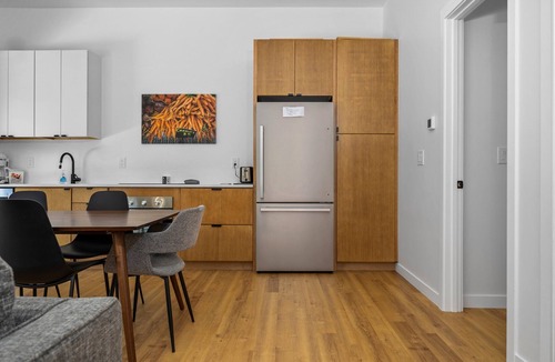 Acme House | KOTI 7 (Two Bedroom) Traverse City's Scandinavian Cabins, vacation home on TART & mins to Traverse C.
