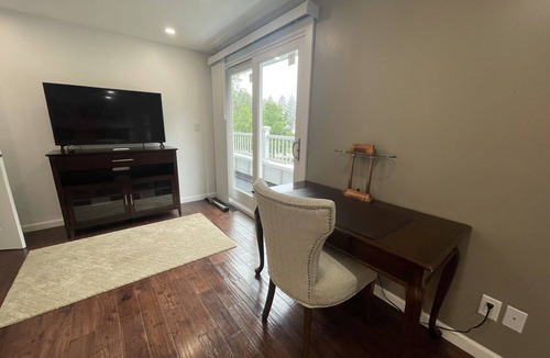 Racine House | Lake Michigan Retreat. Spacious 4-bedroom home on wooded lot across from lake.