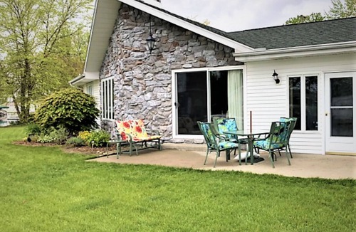 Enchanted Hills House | Lake Wawasee waterfront home overlooking Johnson's Bay. New Renovations for 2026