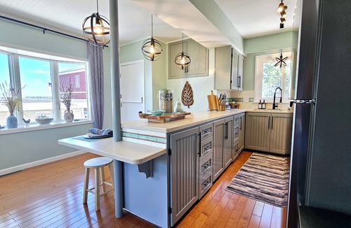 Beachwood-Bluffton House | Lakefront cottage on Muskegon Lake! Fire pit, 40' BOAT DOCK, near beach, shops