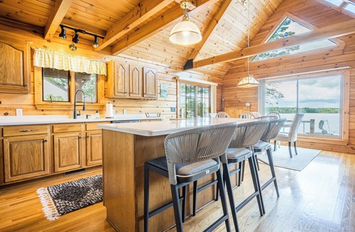 Gladwin Cottage | Lakefront Log Cabin - Sunset + Docks & Outdoor Fun
