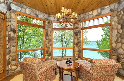 Kewadin House | Lakefront Torch Lake Lodge - 4 Floors of Luxury, 8 Bedrooms, Private Dock