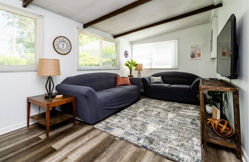 Sister Lakes House | Lakefront with private beach & boat dock