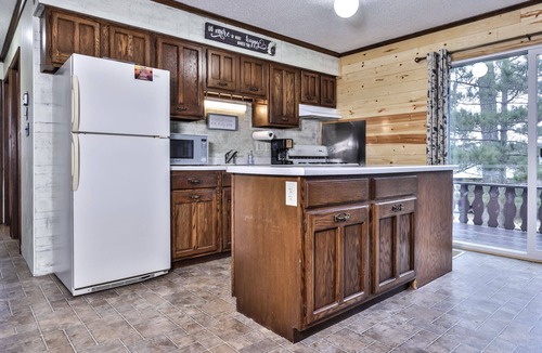 Watersmeet House | Lakeside wilderness resort cabin with dock, fire pit, on-site store, bait shop!
