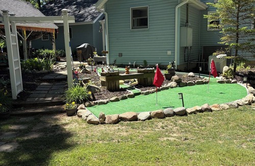 Grand Junction House | Large Lakehouse w Private Beach~Hot Tub~Tiki Hut~Game Rm~Gym~Mini-Golf~Dogs OK!