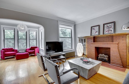 North Center Apartment | Light Filled with Tasteful Pops of Color - You Will Love This Mid-Century Modern Gem by AllSet Turnover