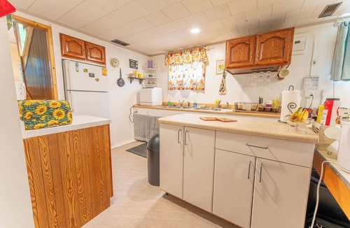 Iron River House | Lighthouse on the Rock: Sunshine and Serenity Await This Summer