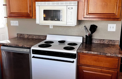 West Allis House | Lower Pro Retreat near Hospitals & Zoo - Garage & Yard. Dog-friendly!