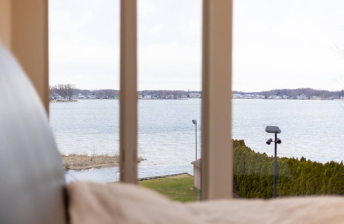 La Porte House | Luxurious Lakefront Estate with Pool, King Beds, Hot Tub MTM Premier Property Management