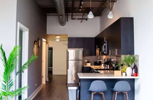 Prairie District Apartment | Modern 3BR Corner Suite Near McCormick Place & Soldier Field that Sleeps 10