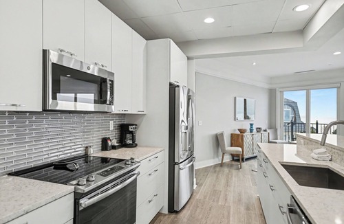 Bay Harbor Condo | Modern Bliss 466: Luxurious 3BR condo in Bay Harbor with stunning lake views.