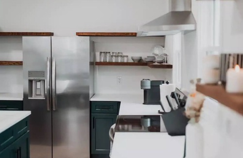 Fletcher Place Apartment | Modern Downtown Indy Apt - King Bed, Patio & Cute Flower Shop Below
