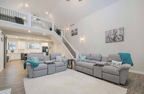 Sawyer House | Modern home with large sun-room, firepit, grill, washer/dryer, & central AC