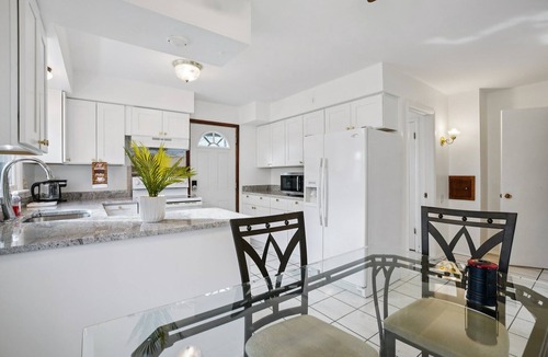 Colgate House | Modern, impeccably styled, a seamless convenience in a prime, quiet location.