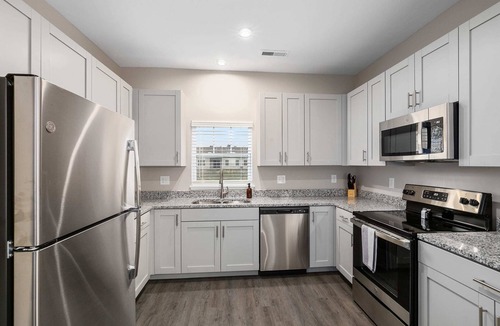 Grandville Condo | Modern New Build 2BR + 2BA Condo w/Garage + Patio