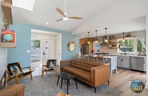 Whitewater House | Modern Whitewater Lake Retreat on Private Cove with Views Screened Porch