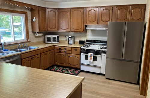 Kalkaska House | Near GLEF 3BR on 5 Acres Hot Tub Huge Yard Camper Hookup