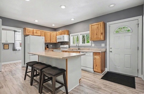 Syracuse House | NEW! Home in beautiful Syracuse with cozy lake vibes and seconds from the water