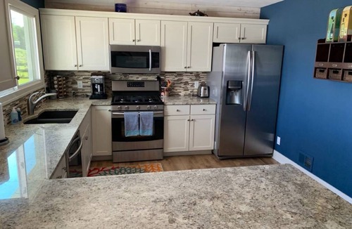 Lowell House | Now Open Summer 2026 ~ Lake House near Grand Rapids ~ Sandy Beach ~Fishing