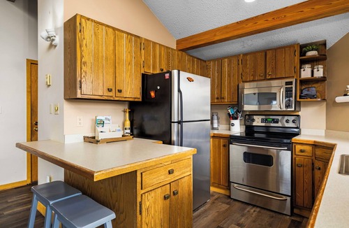 Mancelona Ski Chalet | On 18th green @ shanty creeks Schuss Mtn - Sleeps 8