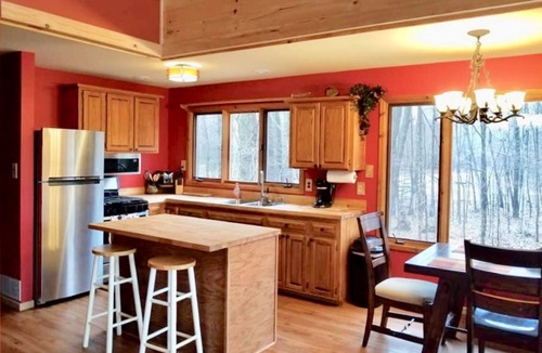 Thompsonville House | On the Betsie River, fish off dock, close to Crystal Mountain, trails, lakes!