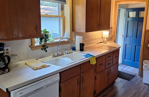 Frederic House | Perfect 4-bedroom house in Frederic for your next getaway. Plenty of parking!