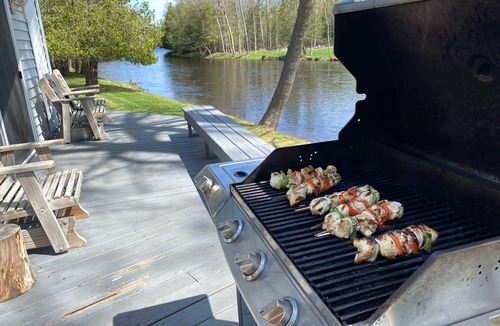 Escanaba House | Pet-Friendly Riverfront Cabin on 5 Acres with Fast Wi-Fi in Central U.P.