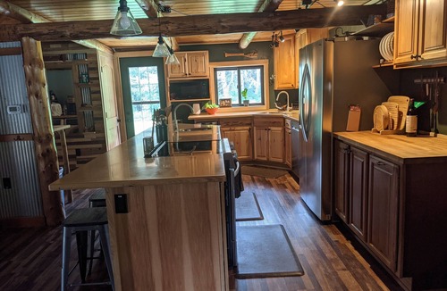 Dunbar Cabin | Private 3 BR 1.5 BA log cabin on 34 acres, driveway is 150' from trails